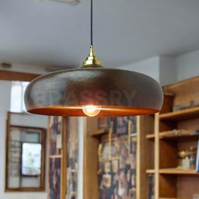 Rustic Moroccan hammered copper dome pendant light with aged finish

