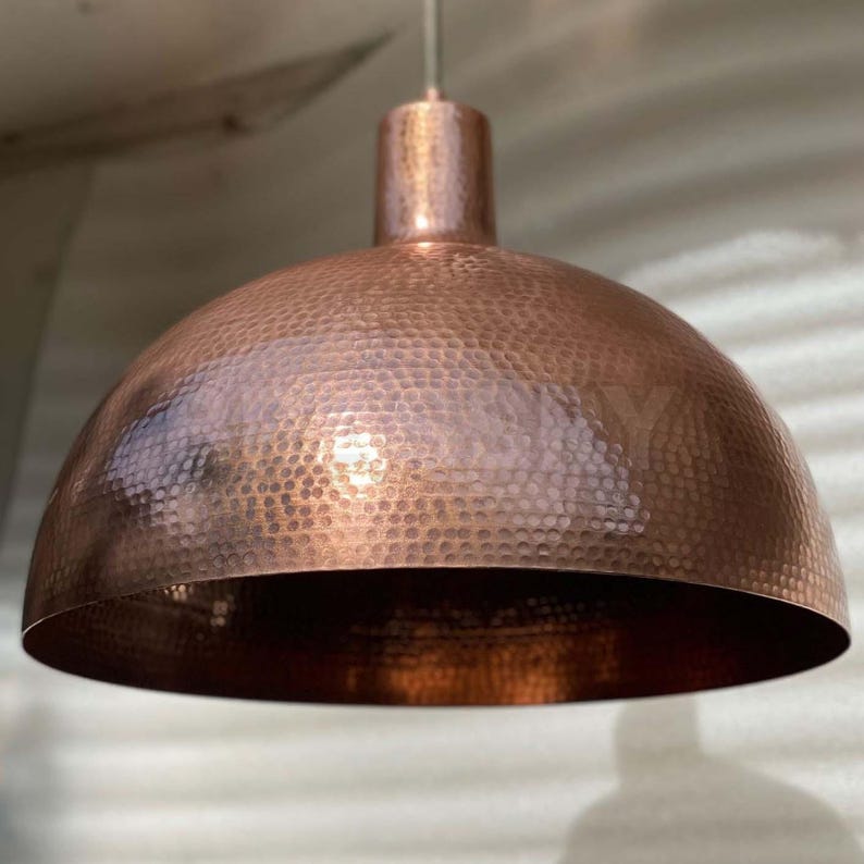 Rustic Moroccan hammered copper dome pendant light with aged finish

