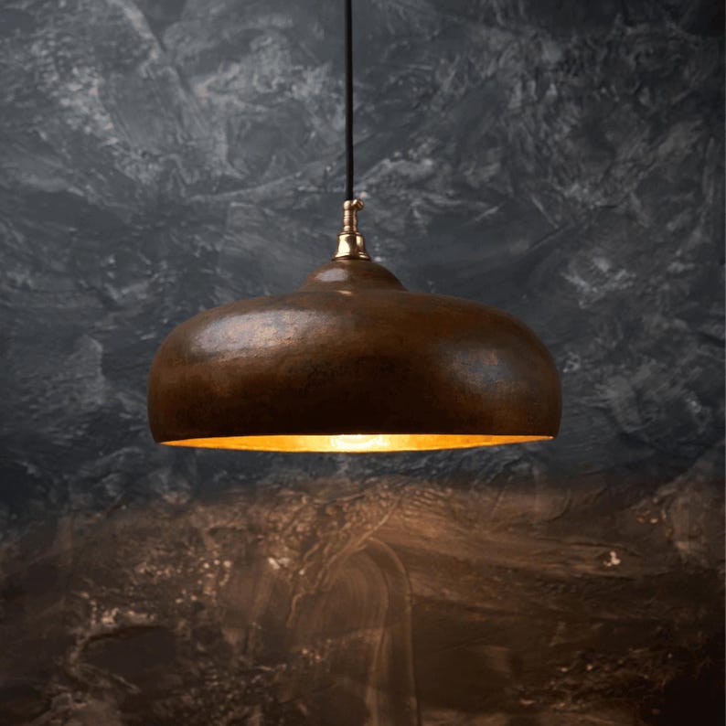 Rustic Moroccan hammered copper dome pendant light with aged finish

