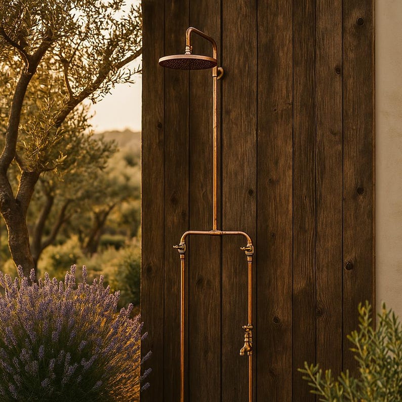 Rustic garden copper shower with dual hot and cold brass valves

