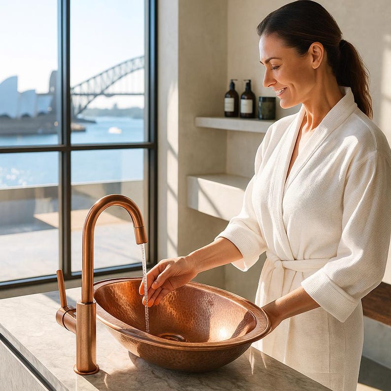 Rustic handmade copper bathroom basin with antique patina