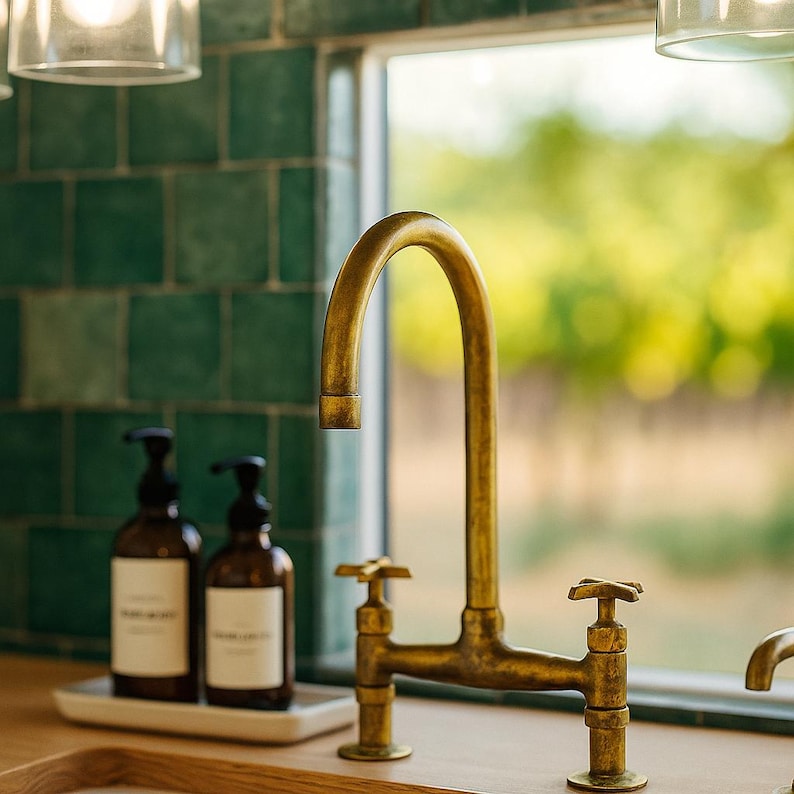 Unlacquered brass farmhouse sink tap with dual handles

