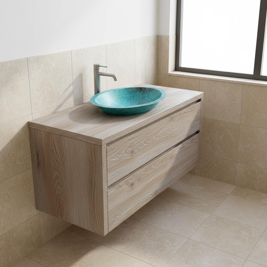 Bathroom vanity with wooden cabinet and turquoise glass sink.