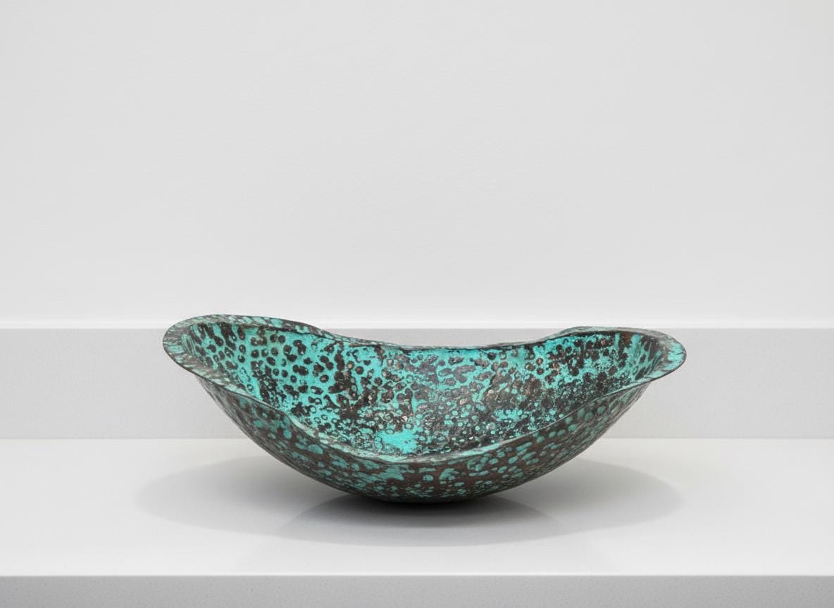 Turquoise ceramic bowl on a white background