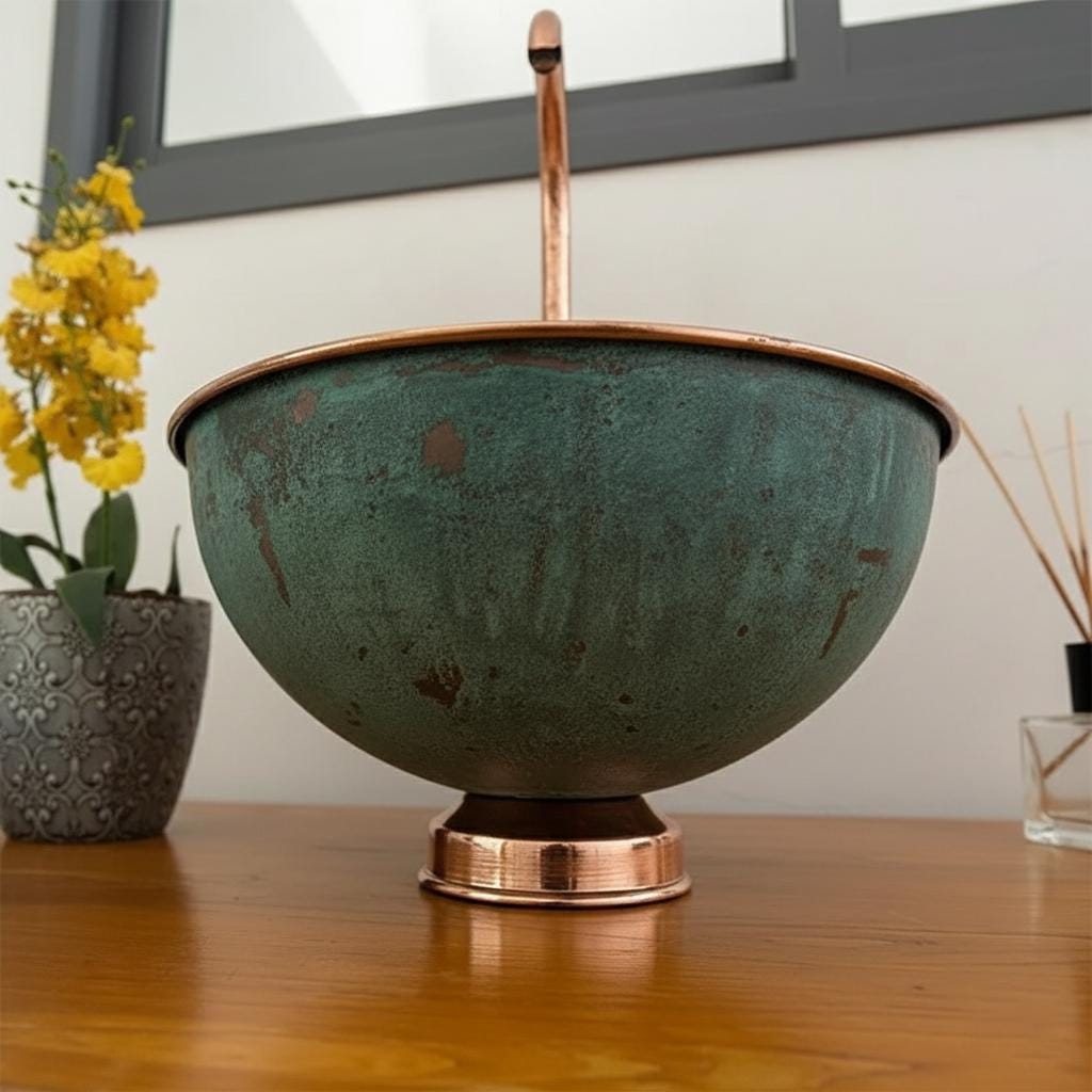 Decorative bowl with copper accents on a wooden surface, featuring a blurred background.