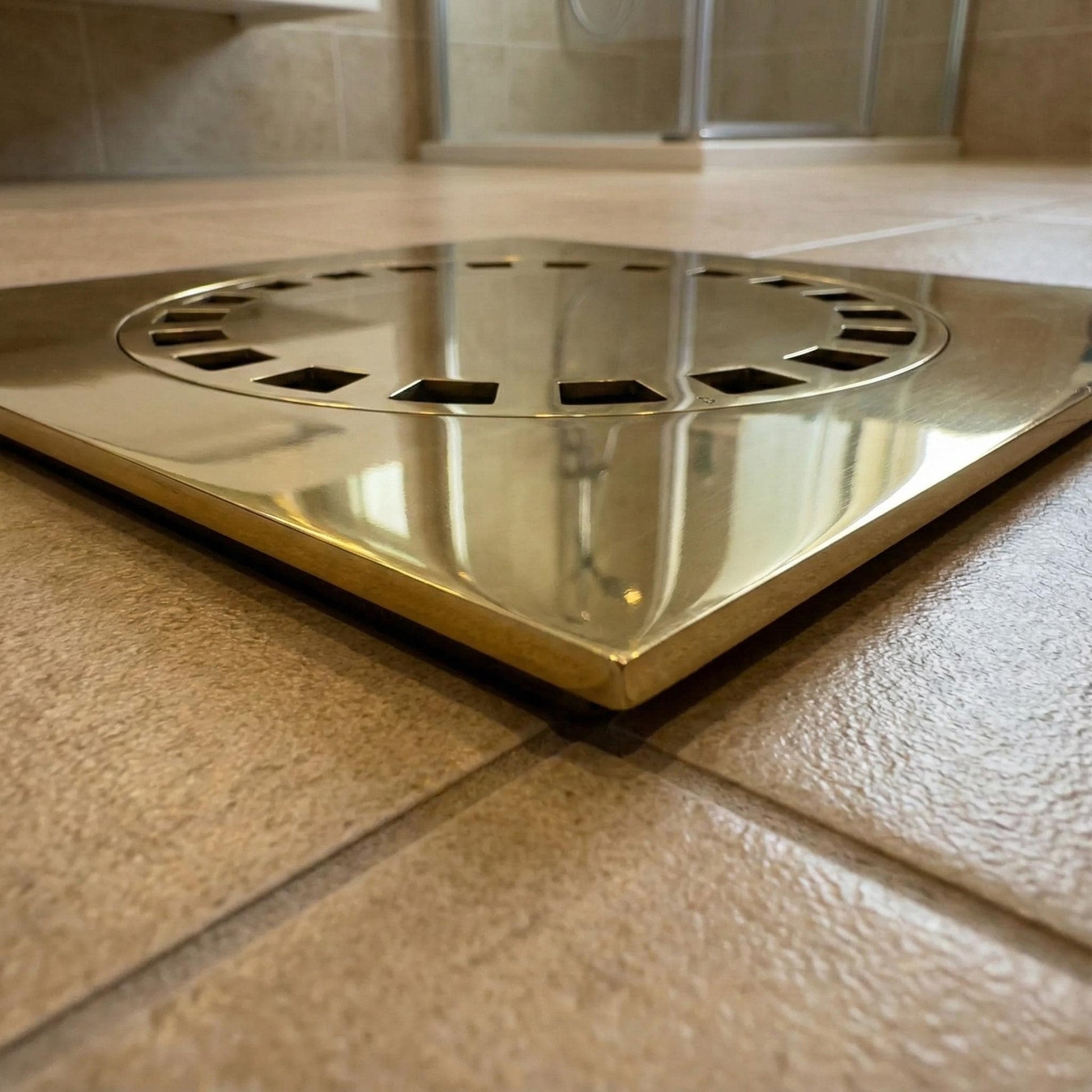  drain cover on a tiled floor