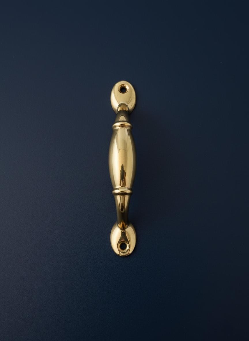 Gold door handle on a dark blue background