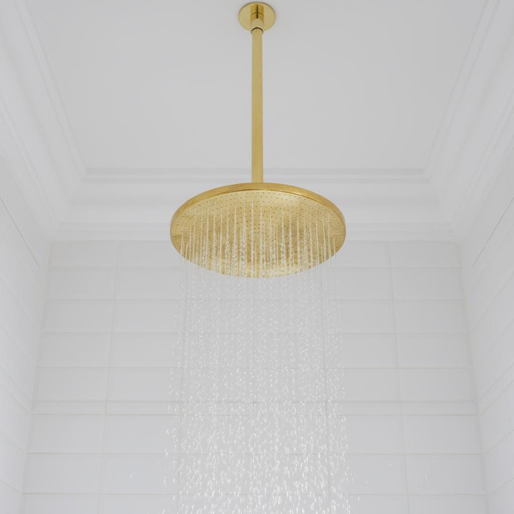 Gold pendant light fixture on a white ceiling