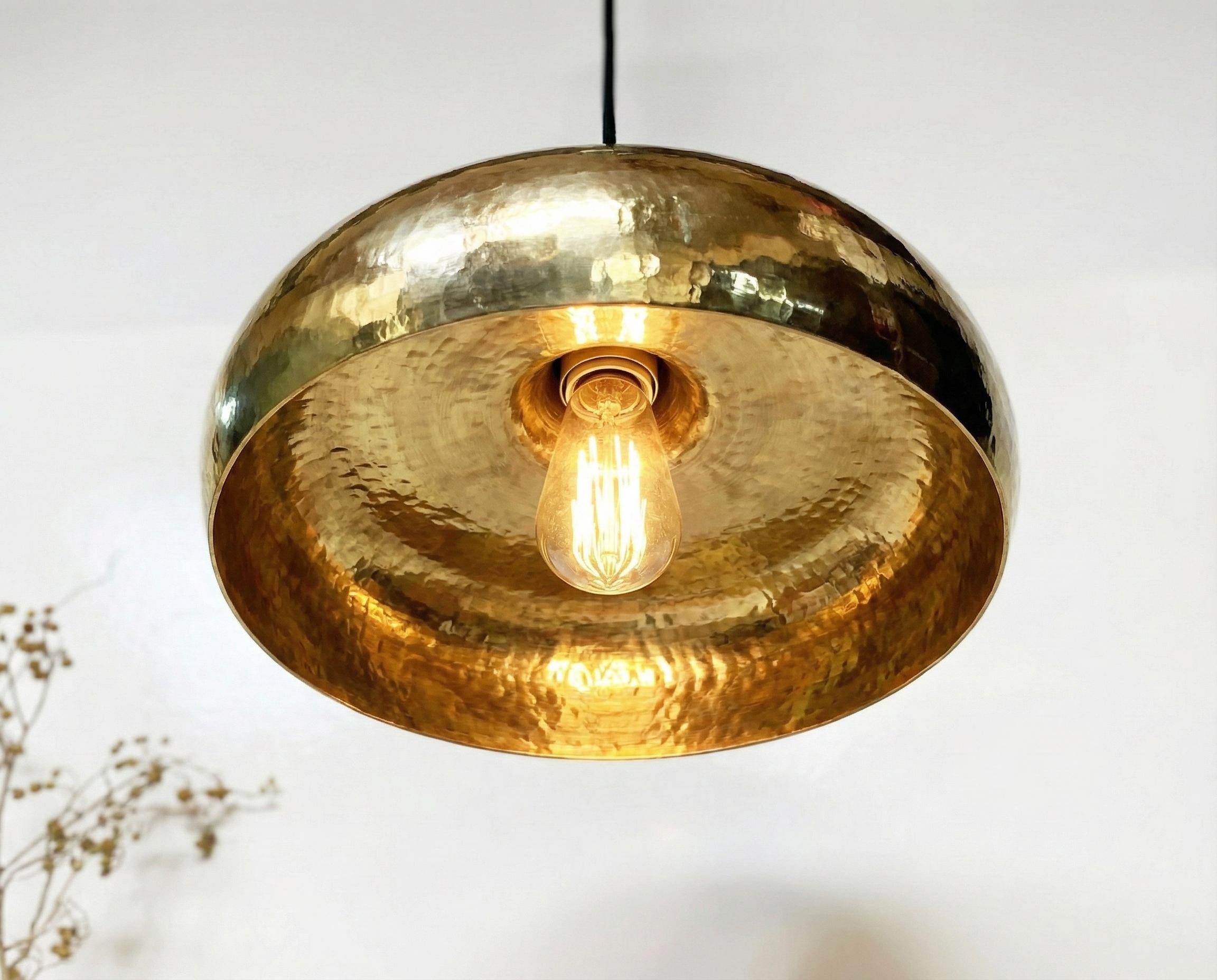 Gold pendant light with a blurred background