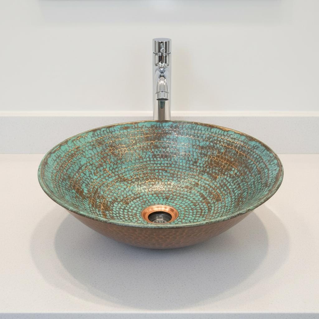 Ceramic sink with decorative pattern on a white background