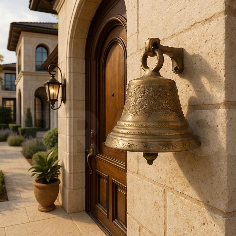 Elegant handcrafted solid brass temple bell with antique finish, decorative front entrance bell for Mediterranean, luxury, or traditional home exteriors


