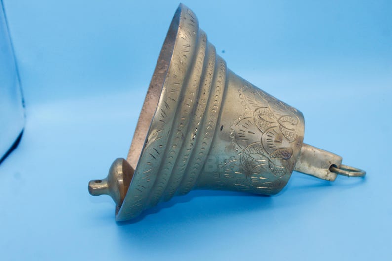 Elegant handcrafted solid brass temple bell with antique finish, decorative front entrance bell for Mediterranean, luxury, or traditional home exteriors

