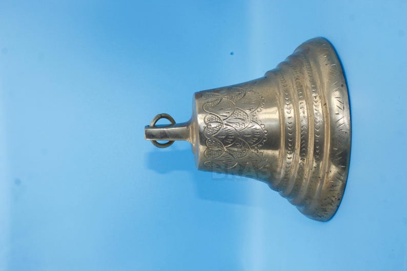 Elegant handcrafted solid brass temple bell with antique finish, decorative front entrance bell for Mediterranean, luxury, or traditional home exteriors

