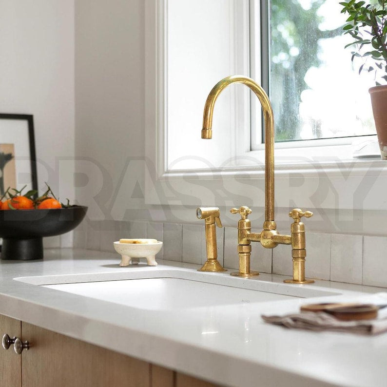unlacquered brass faucet, wall mount bathroom faucet, gooseneck brass faucet, moroccan handmade faucet, rustic brass tap, dual handle faucet, aged brass wall faucet, brass vanity faucet, artisan bathroom fixture, vintage style faucet, wabi sabi faucet, non lacquered brass fixture, solid brass plumbing fixture, farmhouse brass wall faucet

